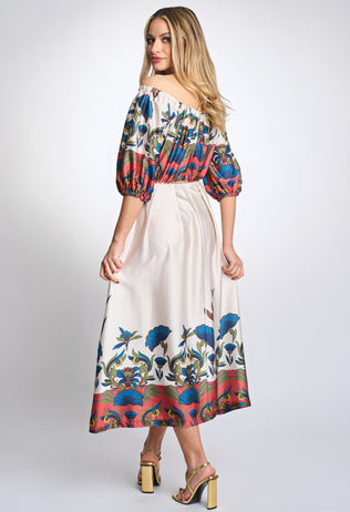 Elegant Bohemian dress with red floral print, chain and puffed sleeves
