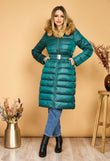 Long green Corina fascinator jacket with natural fur hood and elastic cord at the waist