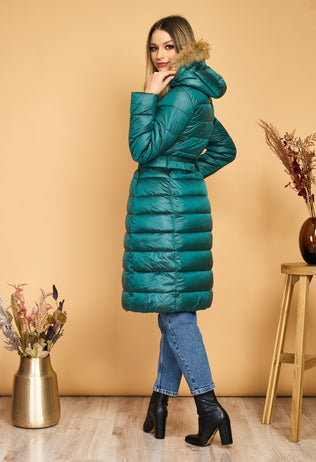 Long green Corina fascinator jacket with natural fur hood and elastic cord at the waist